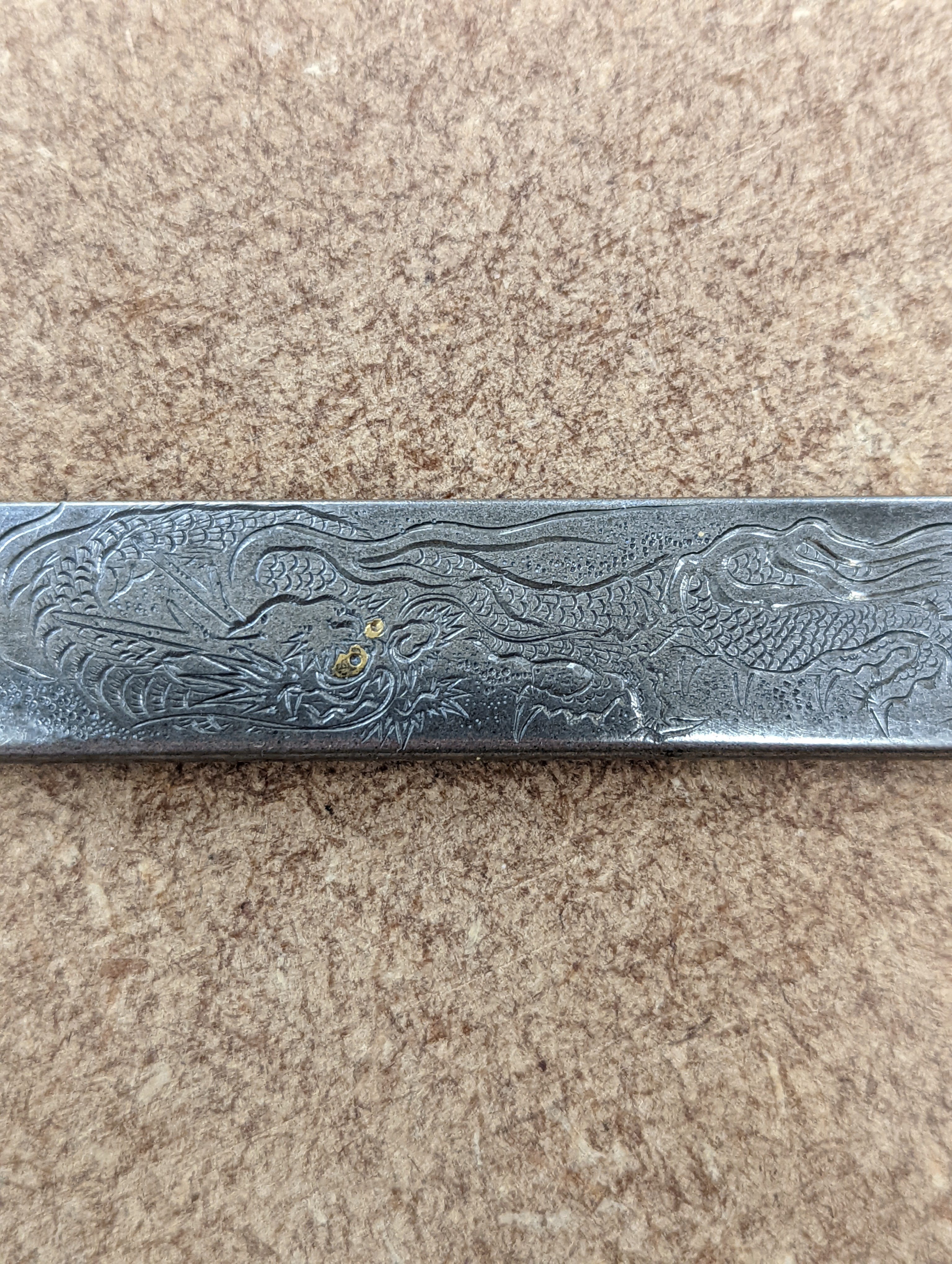 A Japanese mixed metal ‘dragon’ kozuka handle, 19th century, boxed